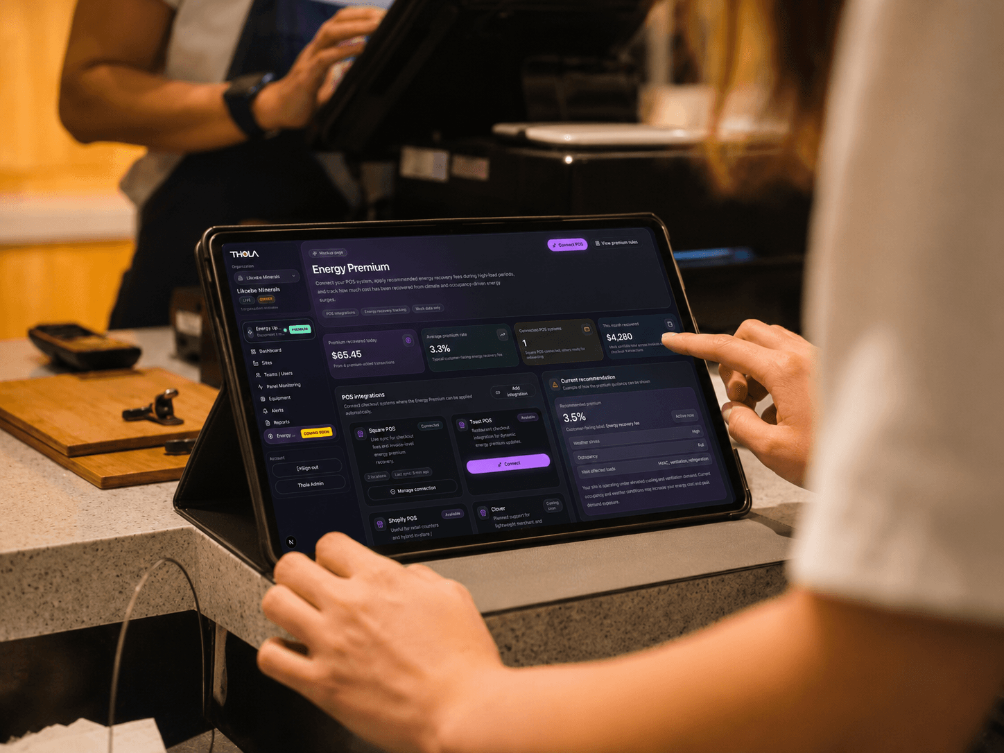 Thola Energy Premium product displayed on a tablet at checkout